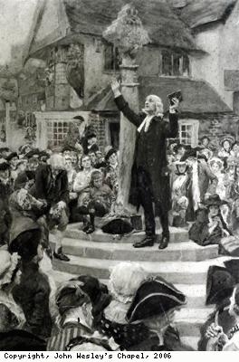 John Wesley preaching from a market cross