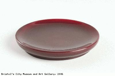 Saucer, possibly a mixing ink or paint