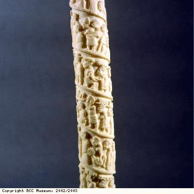 Carved ivory tusk, may show slaves or captives